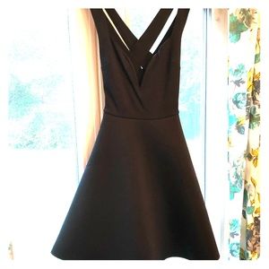Little black dress with criss-cross straps